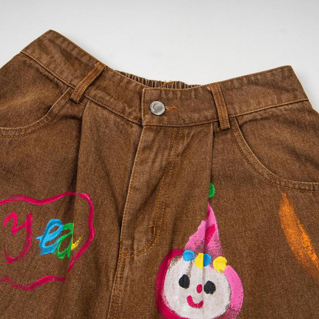 Hand drawn cat and dog graffiti jeans
