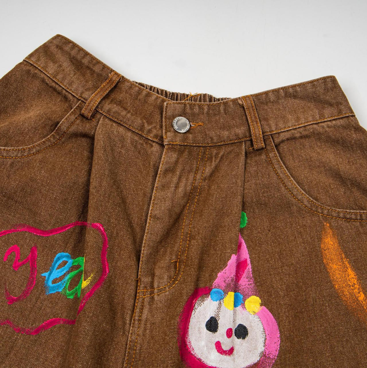 Hand drawn cat and dog graffiti jeans